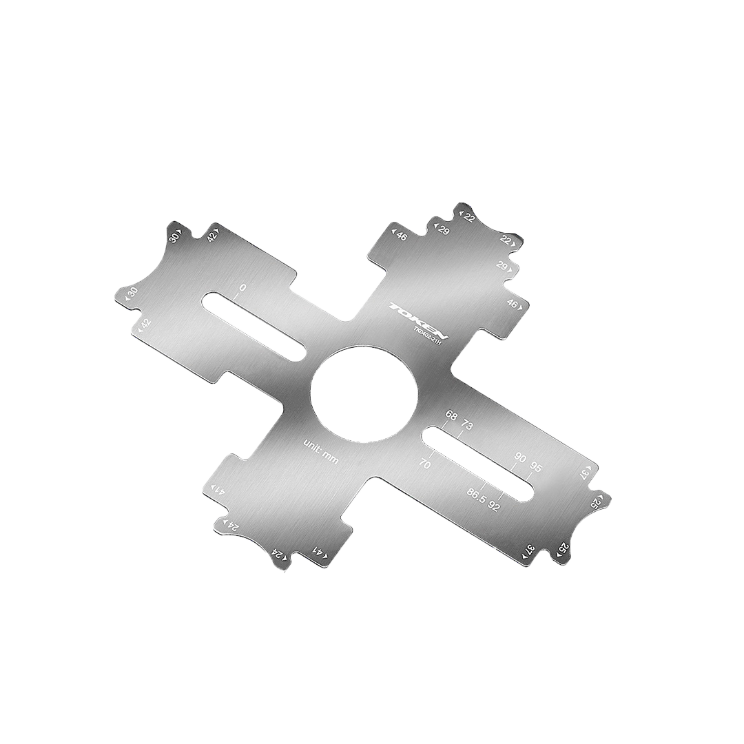 Llave medidora de centros Token